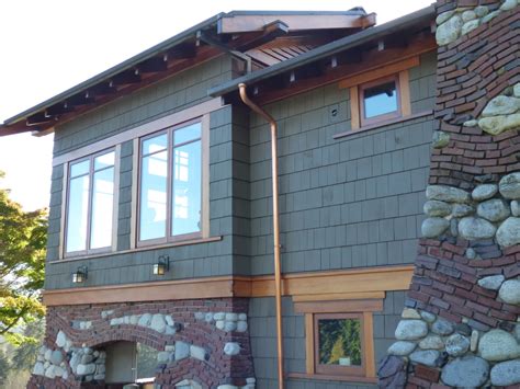 Copper Downspouts & Beam Caps on Greene & Greene Home in Seattle