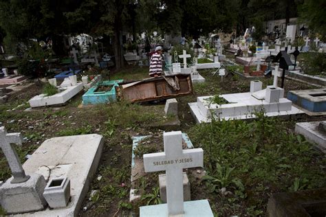 Running out of cemeteries, Mexico City digging up the dead - CBS News