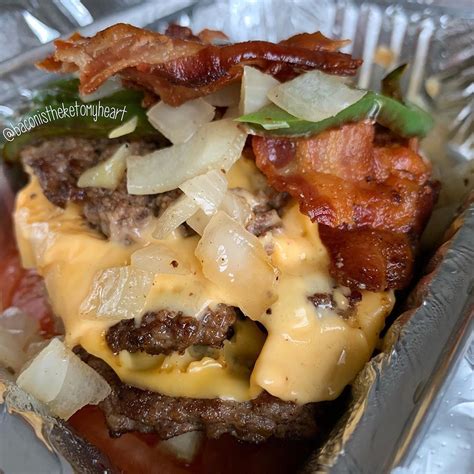 Keto OMAD goodness courtesy of Five Guys! 🤤 Bacon cheeseburger, extra patty, tomato, grilled ...