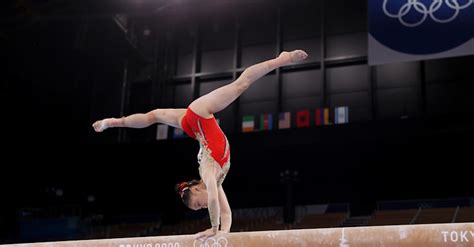 Team China performs on balance beam during qualifications at Tokyo 2020