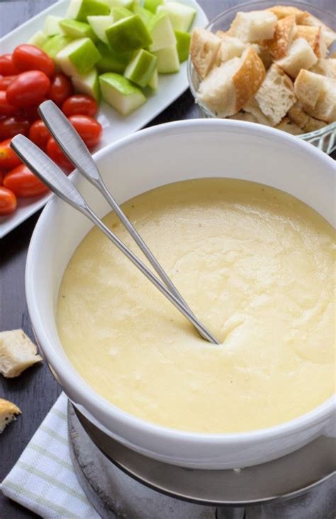 The best cheese fondue recipe. So easy and your friends will be totally impressed! Includes tips ...