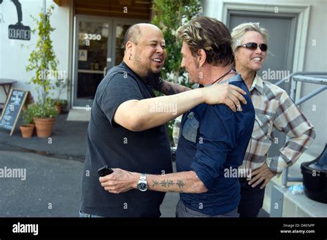 Johnny Hallyday greets members of Paul McCartney's band Abe Laboriel ...