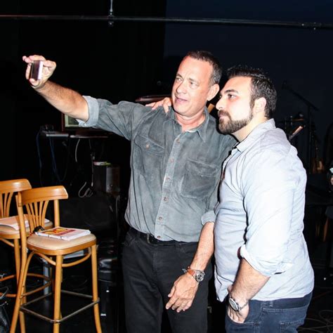 Tom Hanks took a snap with a friend in September 2013 at a ...