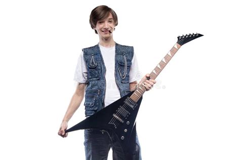 Smiling Young Man Holding Electric Guitar Stock Image - Image of playing, background: 97275277