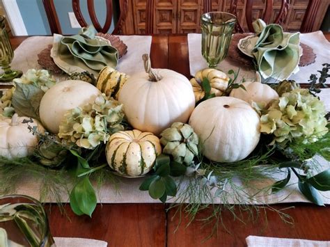 My centerpiece I made from various sized white pumpkins and squash with ...