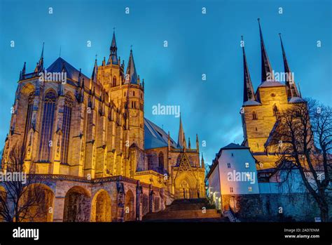 The famous Cathedral and Severi church in Erfurt illuminated after sunset Stock Photo - Alamy