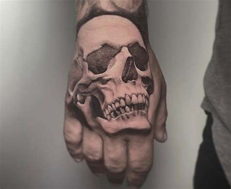 Skull Hand Tattoos For Men