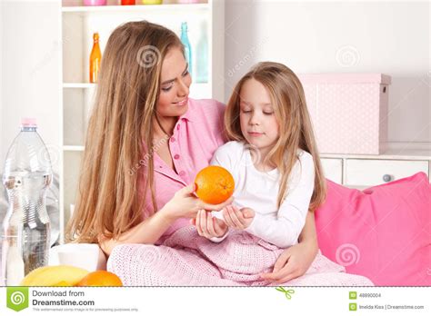 Mother Taking Care of Sick Child Stock Photo - Image of healthy, couch ...