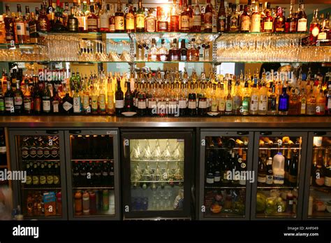 bottles behind a bar of a club cocktail Stock Photo - Alamy