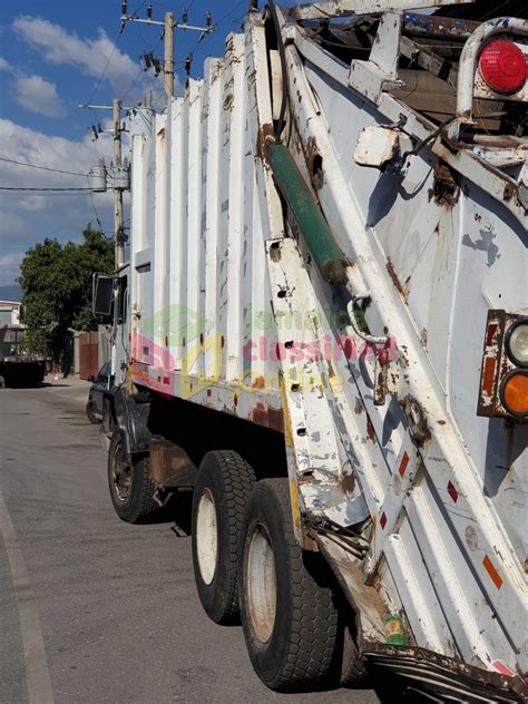 For Sale: 1994 Mack Rear Loader Garbage Truck - Three Miles