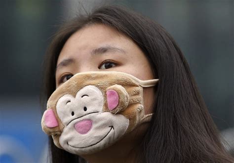 China Is Facing The Smog With Stylish Masks (22 pics)