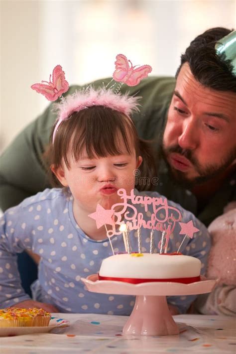 Father with Down Syndrome Daughter Celebrating Birthday with Party at ...