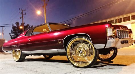 Ace-1: Candy Red 71 Chevy Impala Donk on All Gold 26" Forgiato Wire Wheels