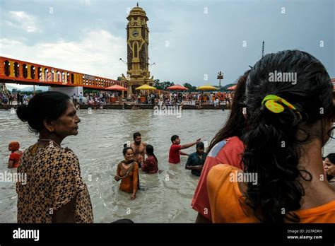 Haridwar, India - July 2021: Pilgrims bathing in the Ganges River at ...