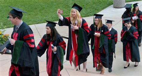 Vivian Lee wins praise, standing ovation from University of Utah medical school grads, speaker ...