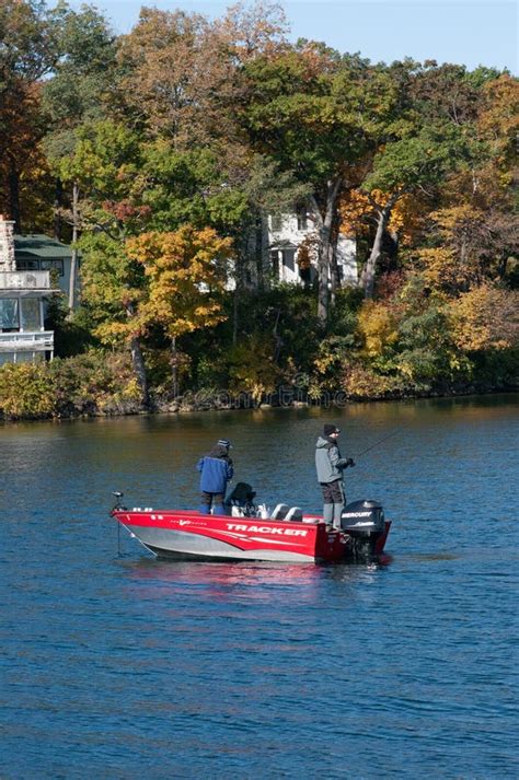 Two Fishermen Fishing from a Boat in Lake Delavan, Wisconsin Editorial Stock Image - Image of ...