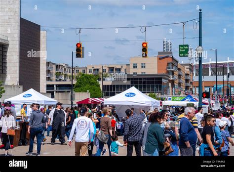 People gather along the riverfront at Cincinnati's Asian American Food Festival; May, 2019 ...