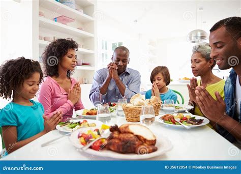 Multi Generation African American Family Praying at Home Stock Photo - Image of granddaughter ...