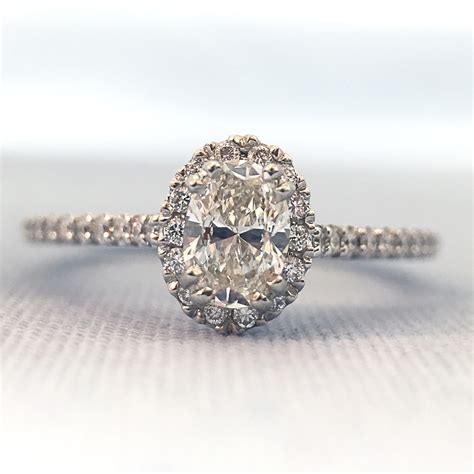 Oval Shaped Diamond Halo Engagement Ring (.64ct GIA) in Modesto