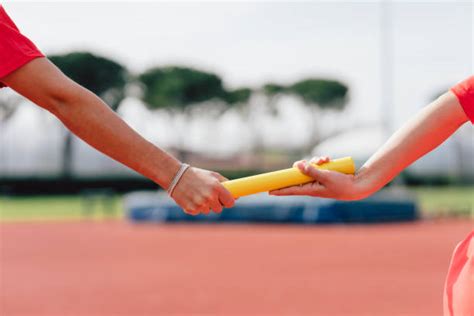 Passing Baton Stock Photos, Pictures & Royalty-Free Images - iStock