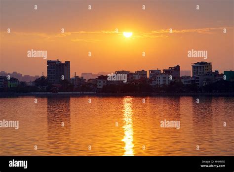 Sunset on west lake (Ho Tay), Hanoi, Vietnam Stock Photo - Alamy