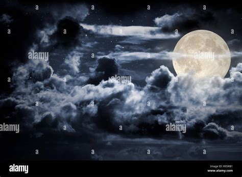 Bright full moon night sky background with strong clouds and stars ...