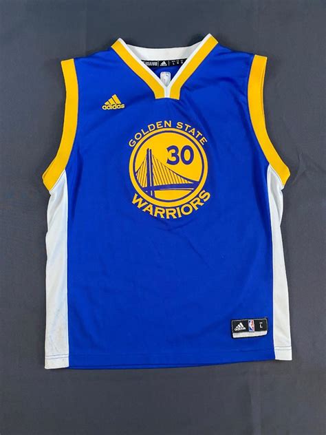 LOT 12: Steph Curry #30 GSW Jersey | EstateSales.org