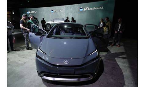 Toyota shows new Prius hybrid with more power, range, style