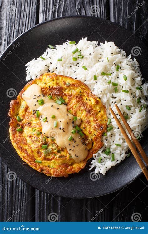 Chinese Omelette Egg Foo Young Served with Rice Close-up. Vertical Top ...