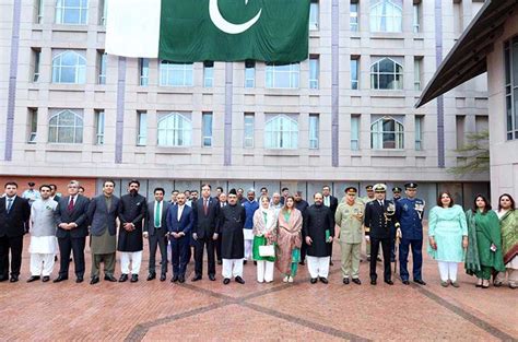 The Officers and officials of Embassy of Pakistan, Washington DC during flag hoisting ceremony ...