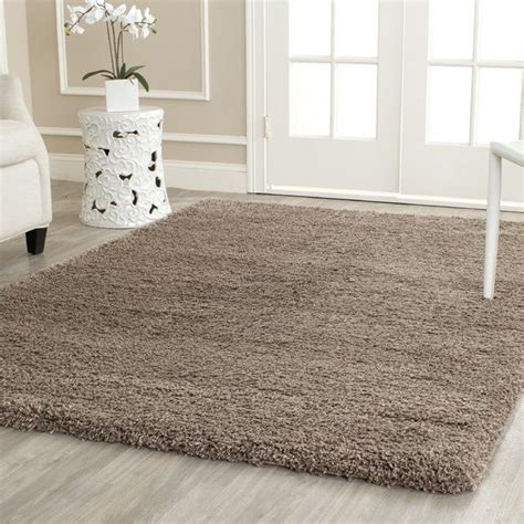 Hand-tufted shag rug in taupe. | Shag area rug, Taupe rug, Cozy shag rug