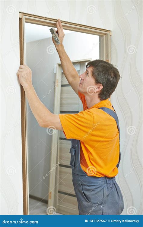 Door Frame Installation. Carpenter Works with Drill Stock Image - Image of installing, people ...