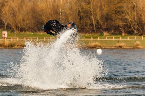 Stunts with a jet ski stock photo. Image of river, pond - 140786188