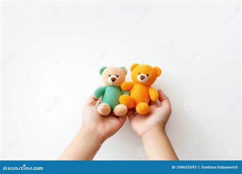 Child Hands Holding Smiling Two Cute Little Teddy Bears on White ...