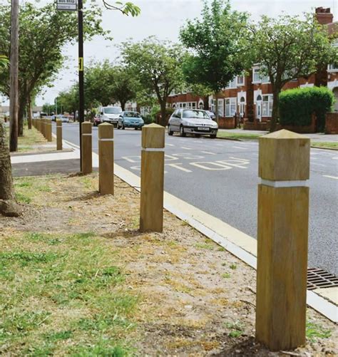 Control car parking with road side wooden bollards | Woodcraft UK