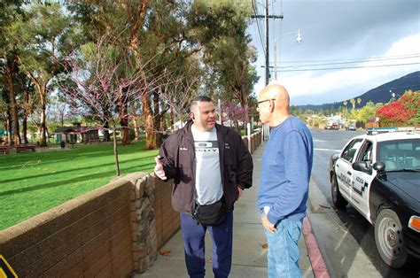 Azusa Mayor Joe Rocha, who was out walking the area, stopped and spoke with Officer Mike Bires ...