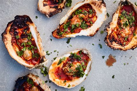 Grilled Oysters With Harissa-Parmesan Butter Recipe