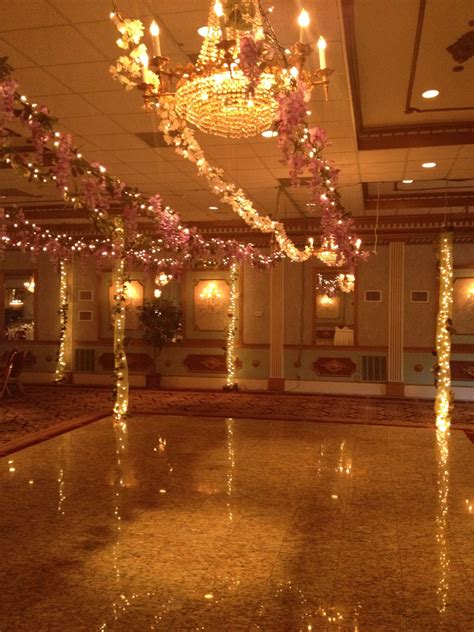 Fairy lights and vines over the dance floor for an Enchanted Forest themed prom | Prom decor ...