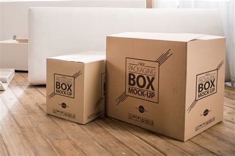Free Packaging Box on Wooden Floor PSD MockupFree Mockup Zone