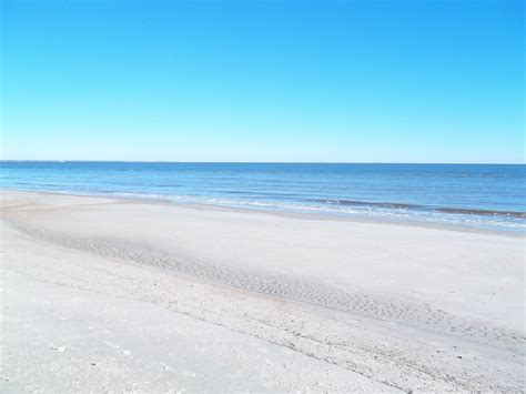 Tybee Beach in Georgia | Beautiful places to visit, Summer adventures, Beach