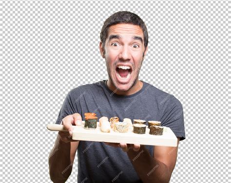 Premium PSD | Young man eating sushi