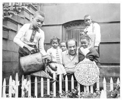 Langston Hughes with children at a community garden in Harlem, NY. 1955. Langston Hughes ...