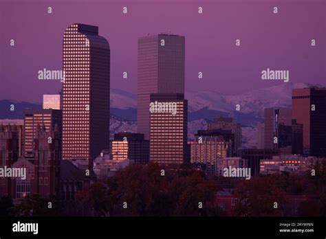 Denver, skyline, snow covered mountains Stock Photo - Alamy