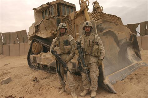 DVIDS - Images - CW4 Clyne and MSG Witmer stand in front of a D9 bulldozer [Image 102 of 208]