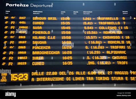 Train timetable in the Turin railway station in Italy Stock Photo - Alamy