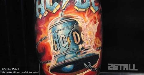 AC/DC's Hell Bells inspired tattoo on the right calf.