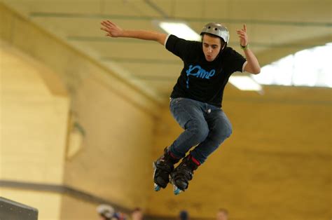 Young Man Doing Tricks on Roller Skates · Free Stock Photo