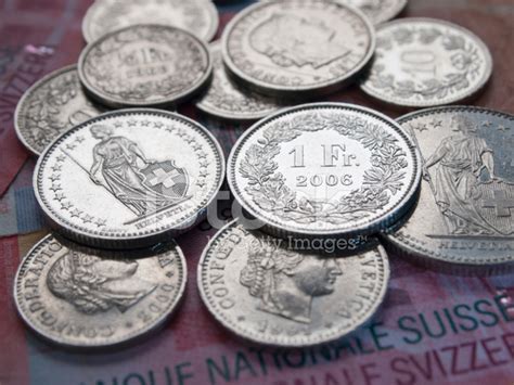 Shining Swiss Franc Coins On 20 Swiss Franc Bank Notes Stock Photo ...