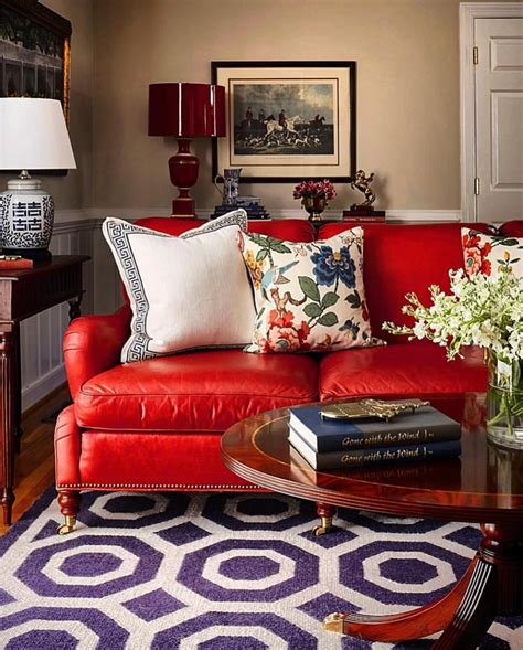 Delightful Living Room featuring this marvelous red sofa!! Interior design by the talented ...