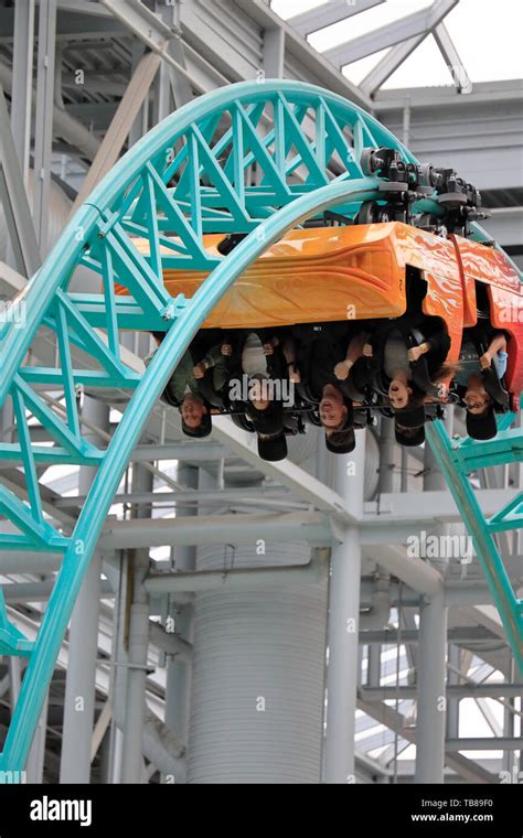 Visitors riding the roller coaster of Spongebob Squarepants Rock Bottom Plunge in Nickelodeon ...